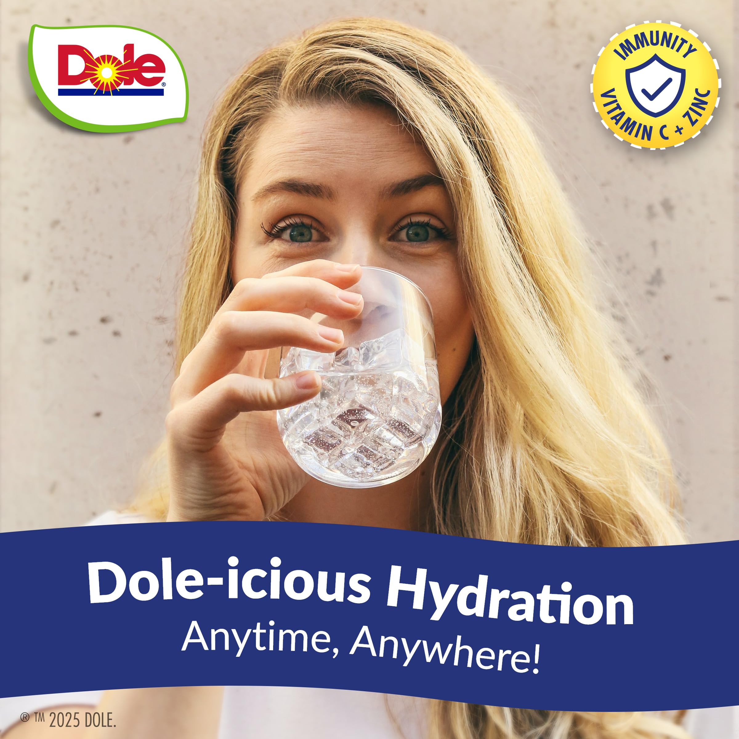 Juicy Mixes Tropical Splash Dole bottle on table, family-friendly flavor ready