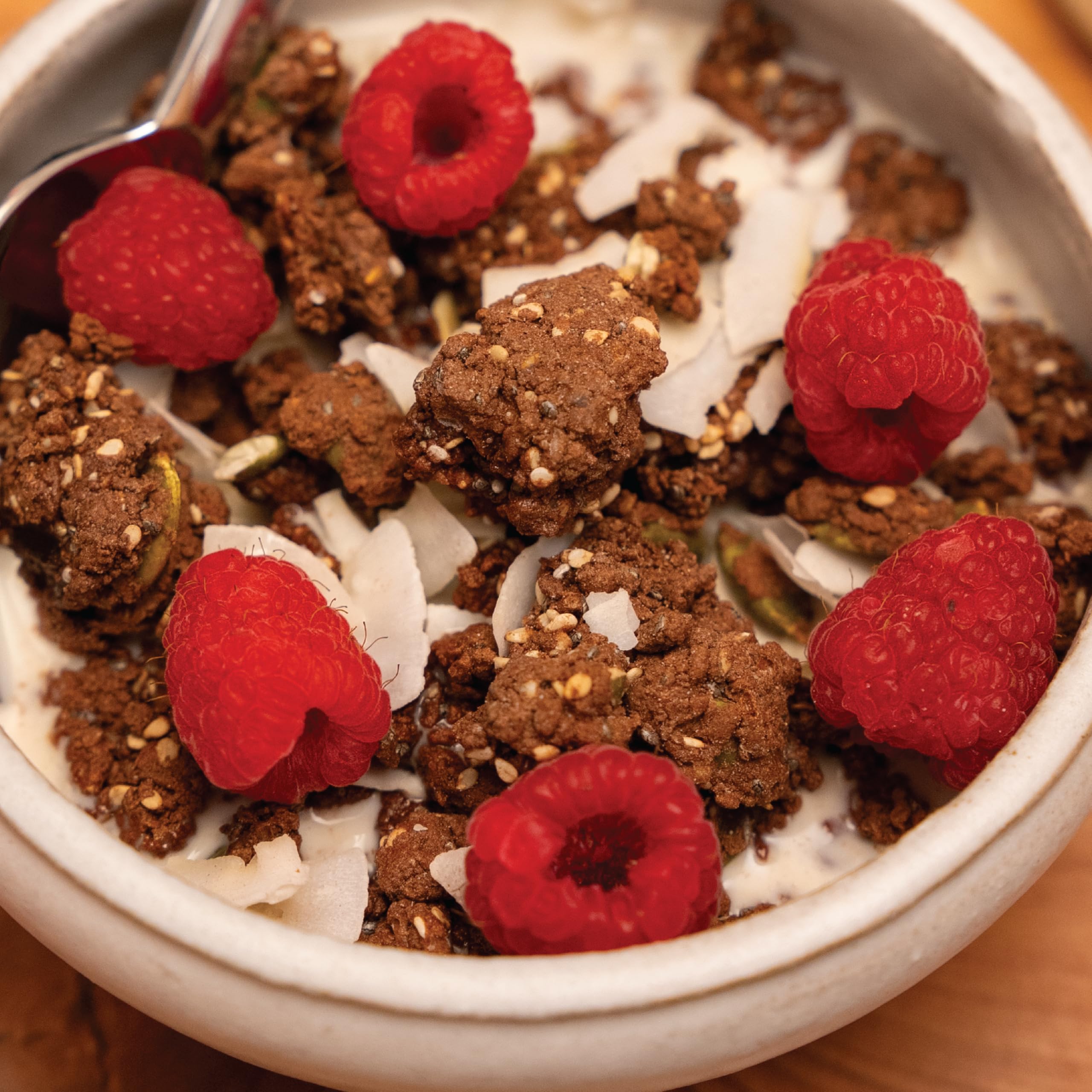 Julian Bakery ProGranola Chocolate breakfast setup emphasizes 2 net carbs per serving.