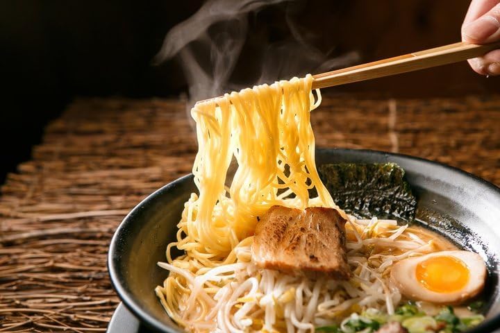 Pour cap feature on June Moon Ramen Seasoning for easy sprinkling