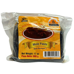 Juquilita Red Mole jar showing glossy sauce, ideal for enriching enchiladas and bowls.