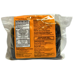 Juquilita Red Mole poured over dish, enhances depth of flavor for meats and vegetables.