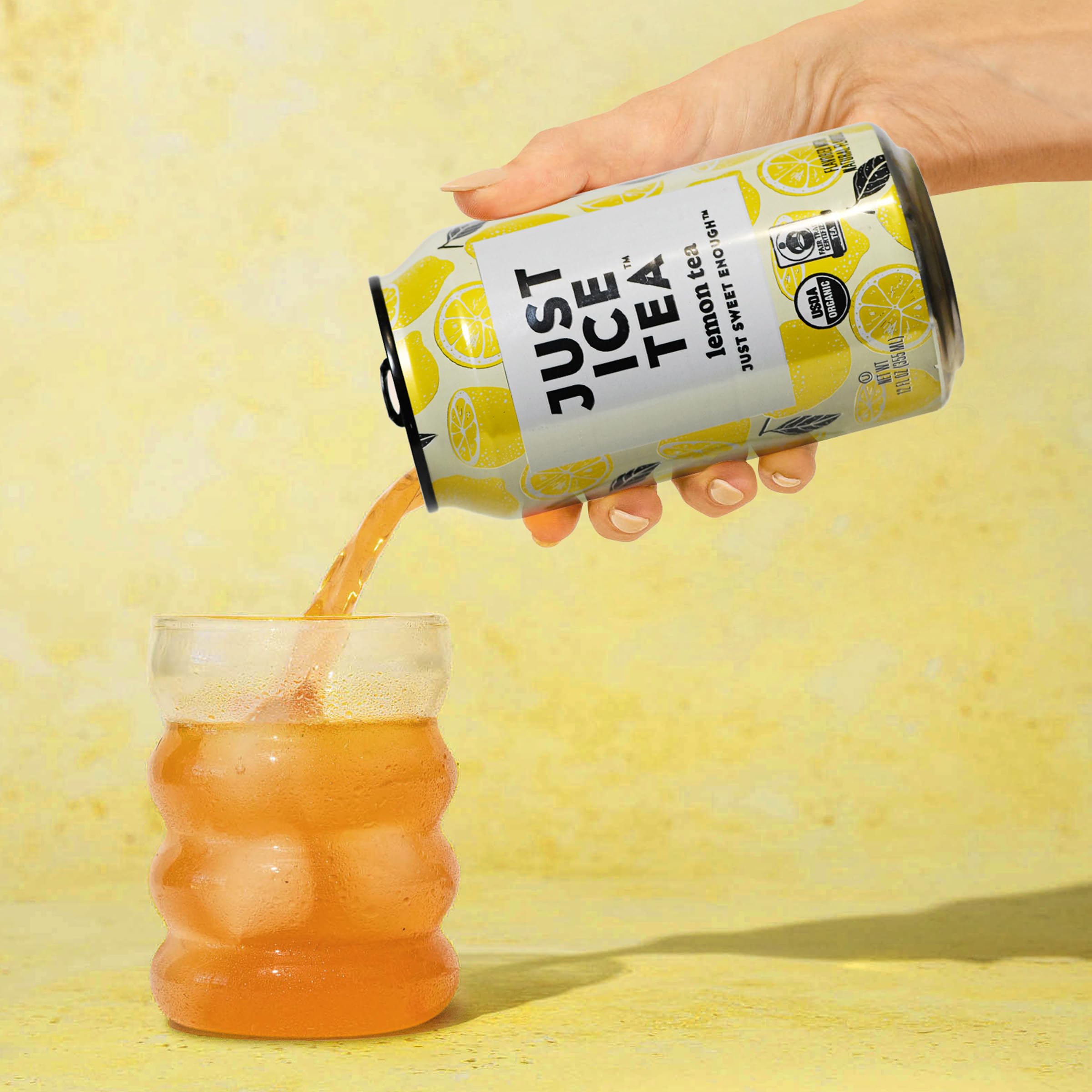 Just Ice Tea Lemon being poured into a glass, real brew aroma rising