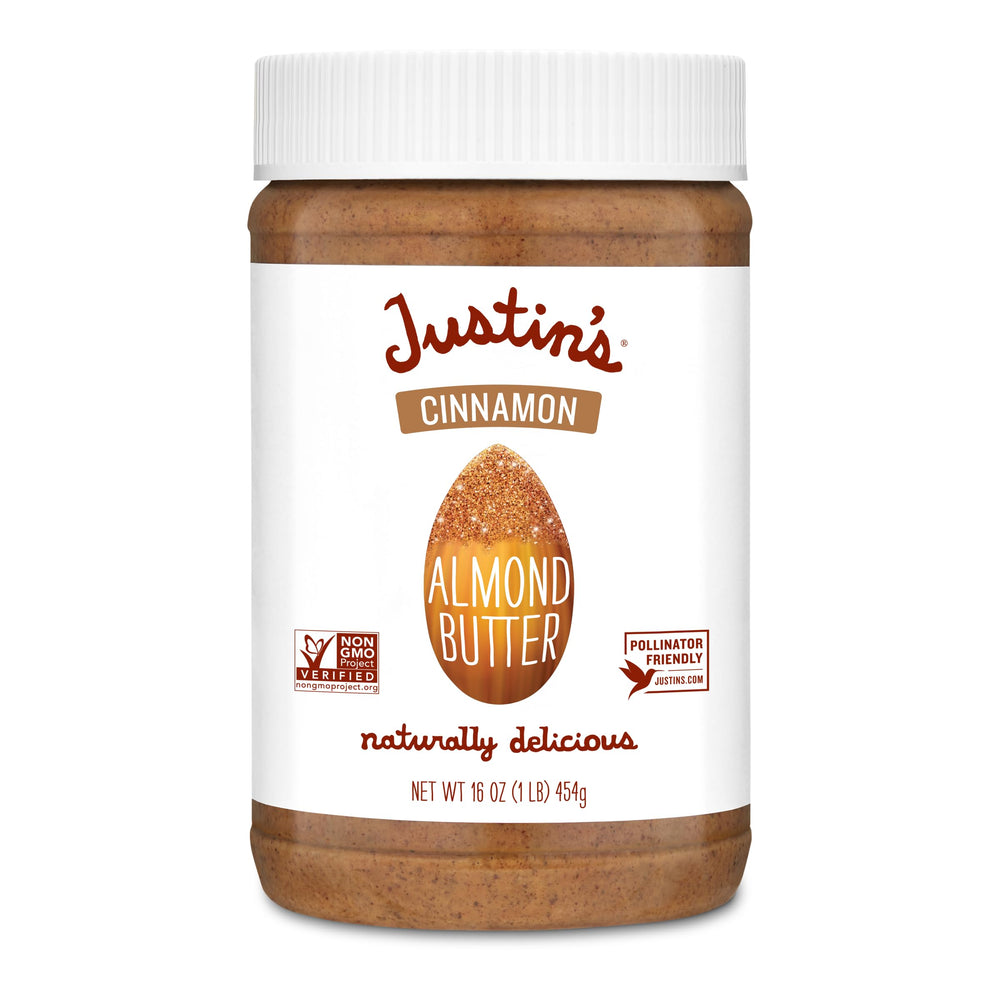 Justin's Almond Butter Cinnamon jar close-up shows creamy texture and warm aroma.