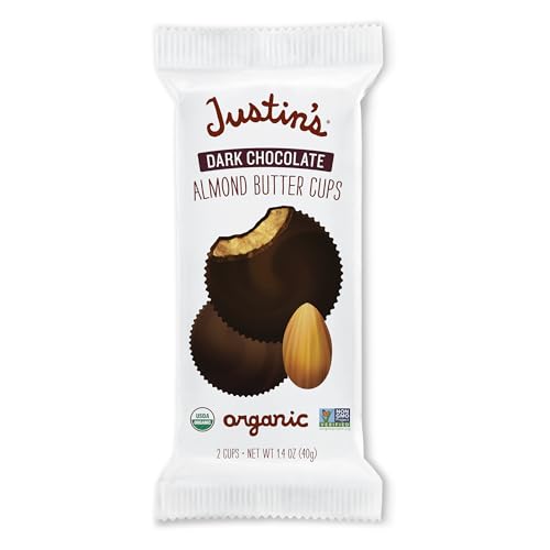 Halved Justin's Cup reveals almond butter center and dark chocolate coating.