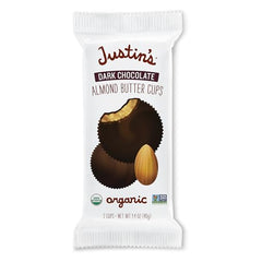 Halved Justin's Cup reveals almond butter center and dark chocolate coating.