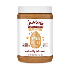 Justins Butter Peanut Crunchy jar on kitchen counter, ready to snack with crunch.