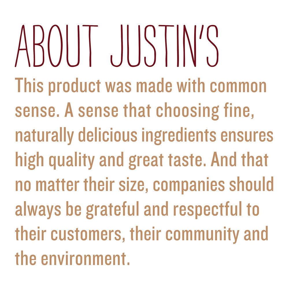 Justin's cinnamon almond butter texture close-up highlighting smooth spreadability.