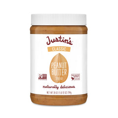 Justin's Classic Peanut Butter Jar on kitchen counter, smooth texture for quick snacks.