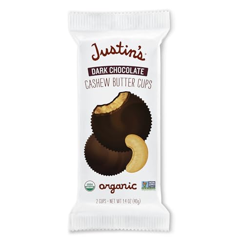 Justin's organic dark chocolate cups close-up texture highlighting creamy cashew butter.
