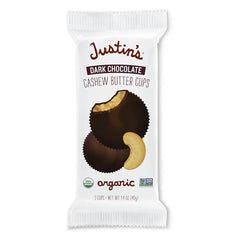Justin's organic dark chocolate cups close-up texture highlighting creamy cashew butter.