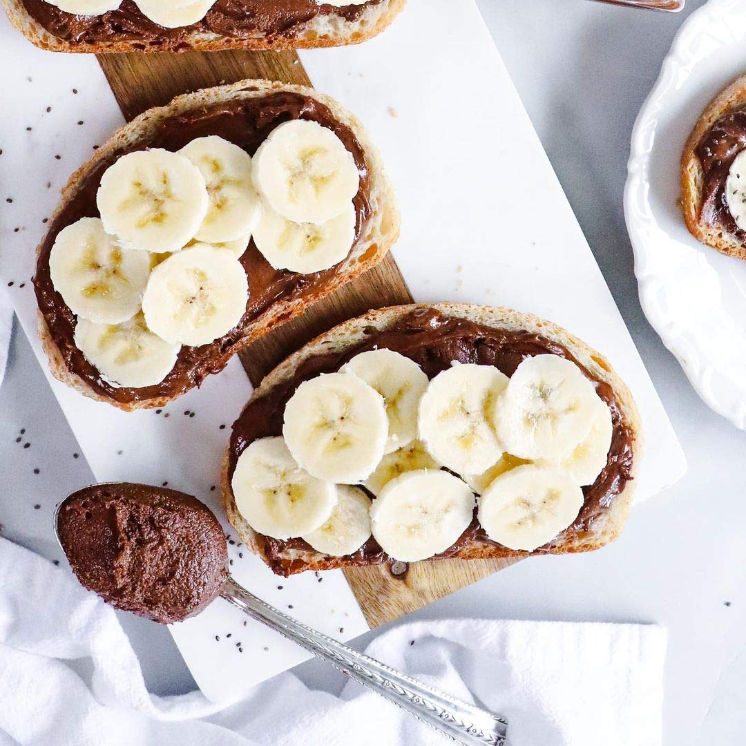 Justin's Hazelnut Almond Butter Chocolate ingredients label highlighting GMO-free essentials