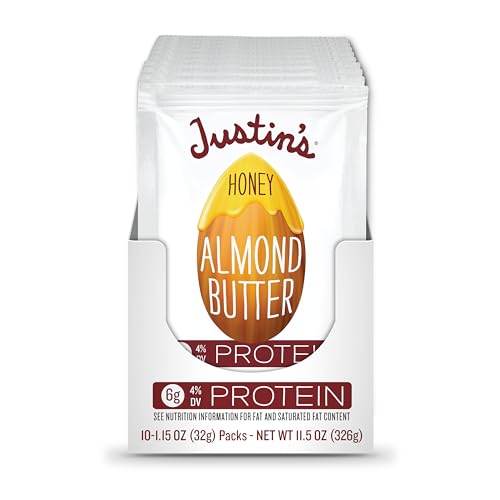 Justin's Honey Almond Butter Squeeze packs on table showcasing variety for tasting during adventures
