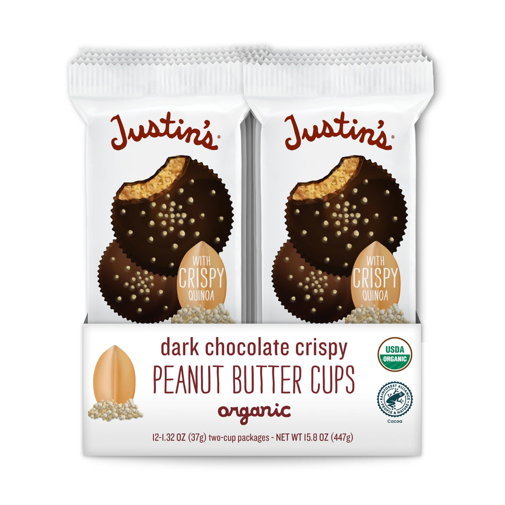 Justin's organic crispy dark chocolate peanut butter cups in 12-pack display, gluten-free and non-GMO snack option.