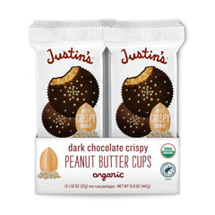 Justin's organic crispy dark chocolate peanut butter cups in 12-pack display, gluten-free and non-GMO snack option.