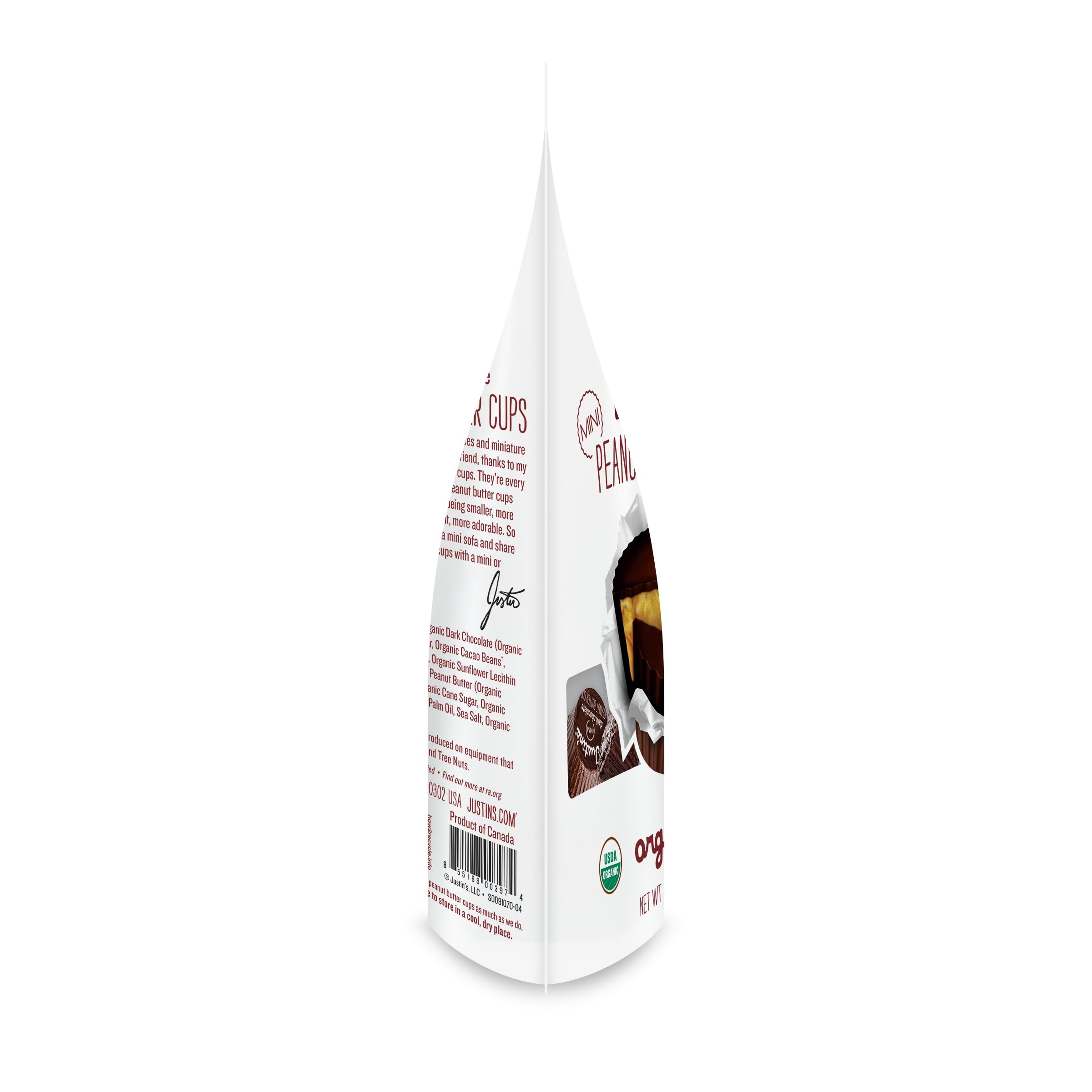 Justin's Mini Cups in hand, convenient single-serve indulgence for on-the-go moments.