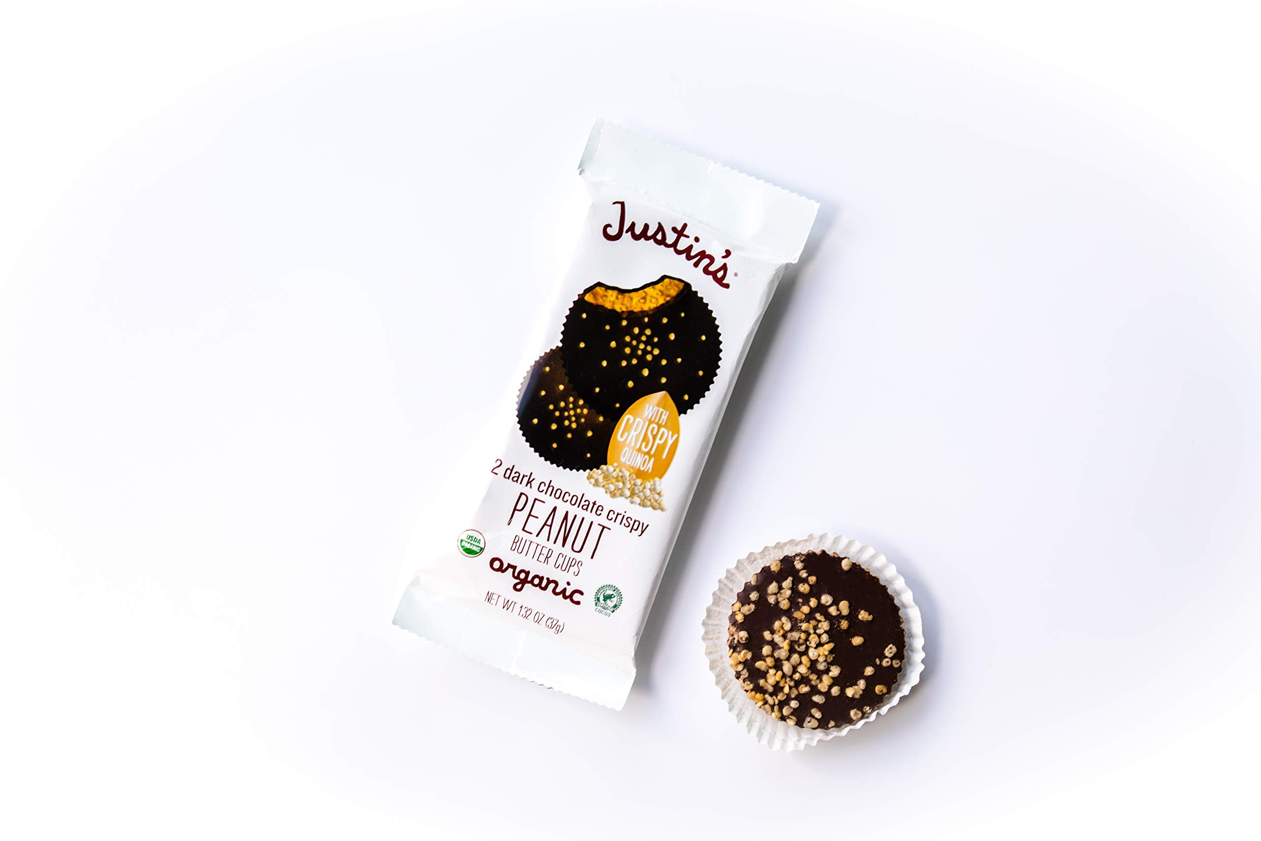 Display of assorted Justin's organic chocolate cups encourages tasting varieties.