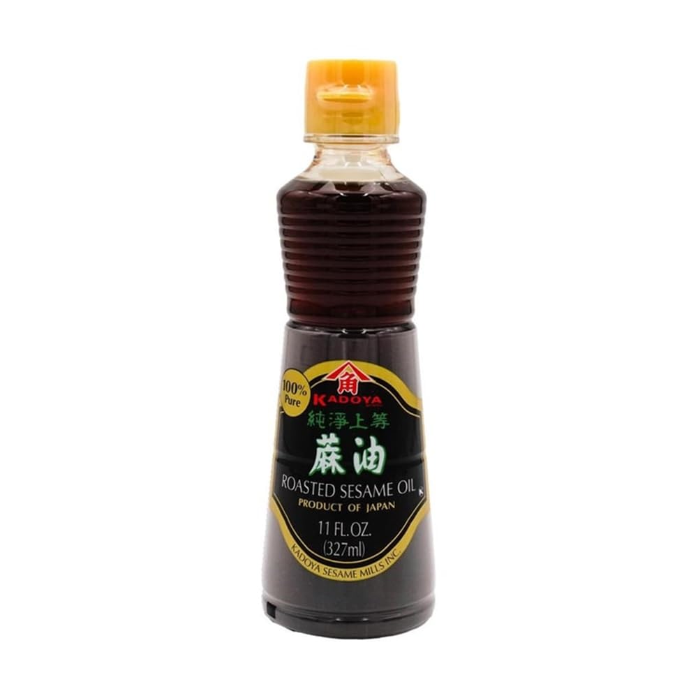 Kadoya Roasted Sesame Oil bottle for marinades and versatile seasoning.