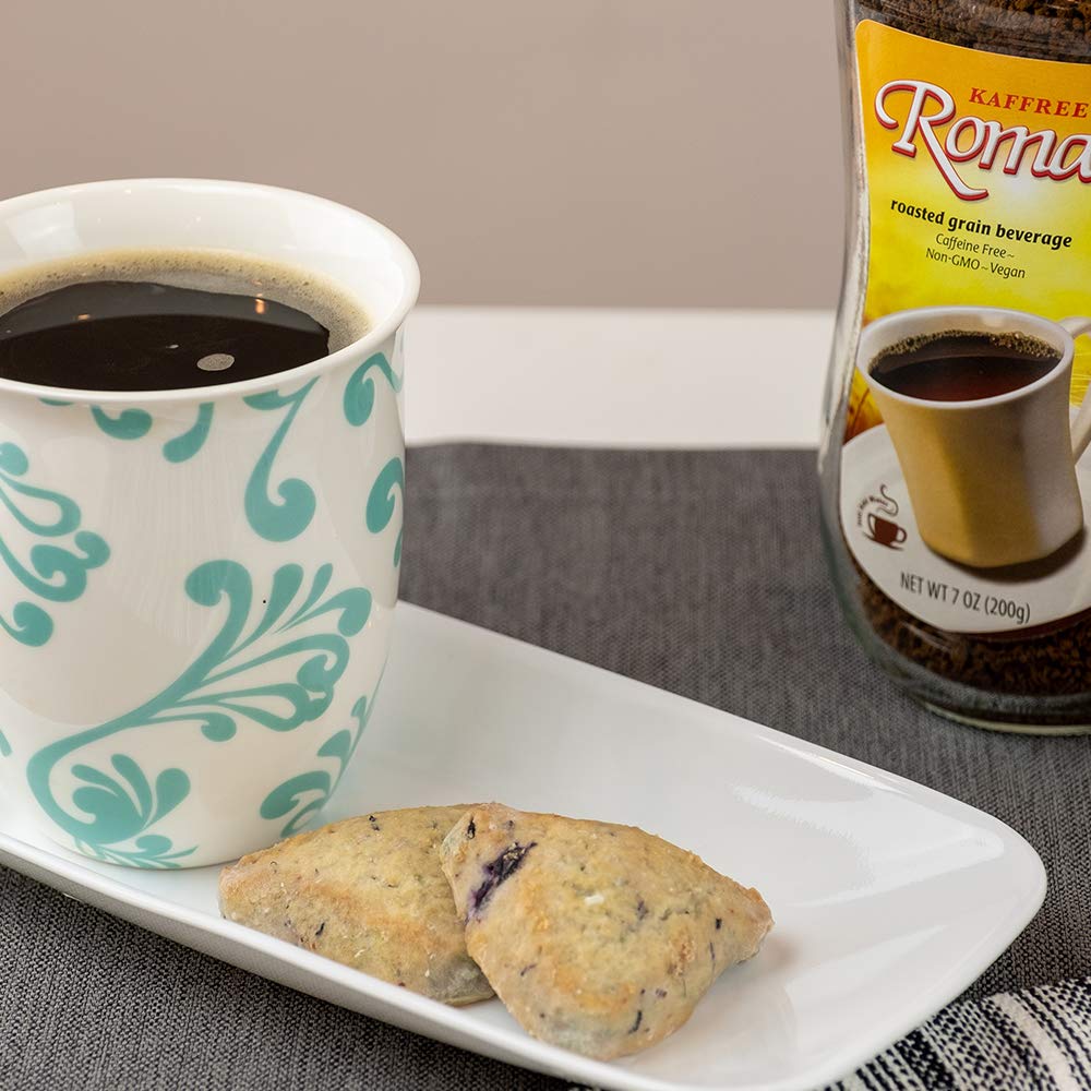 Kaffree Roma Original jar with measuring spoon highlights three-ingredient barley-chicory-rye blend.