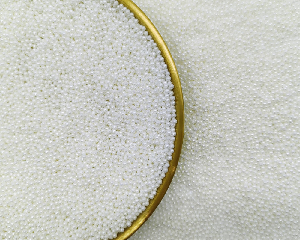 KANDLRIK white 2mm pearls for cupcakes add subtle shine and texture.