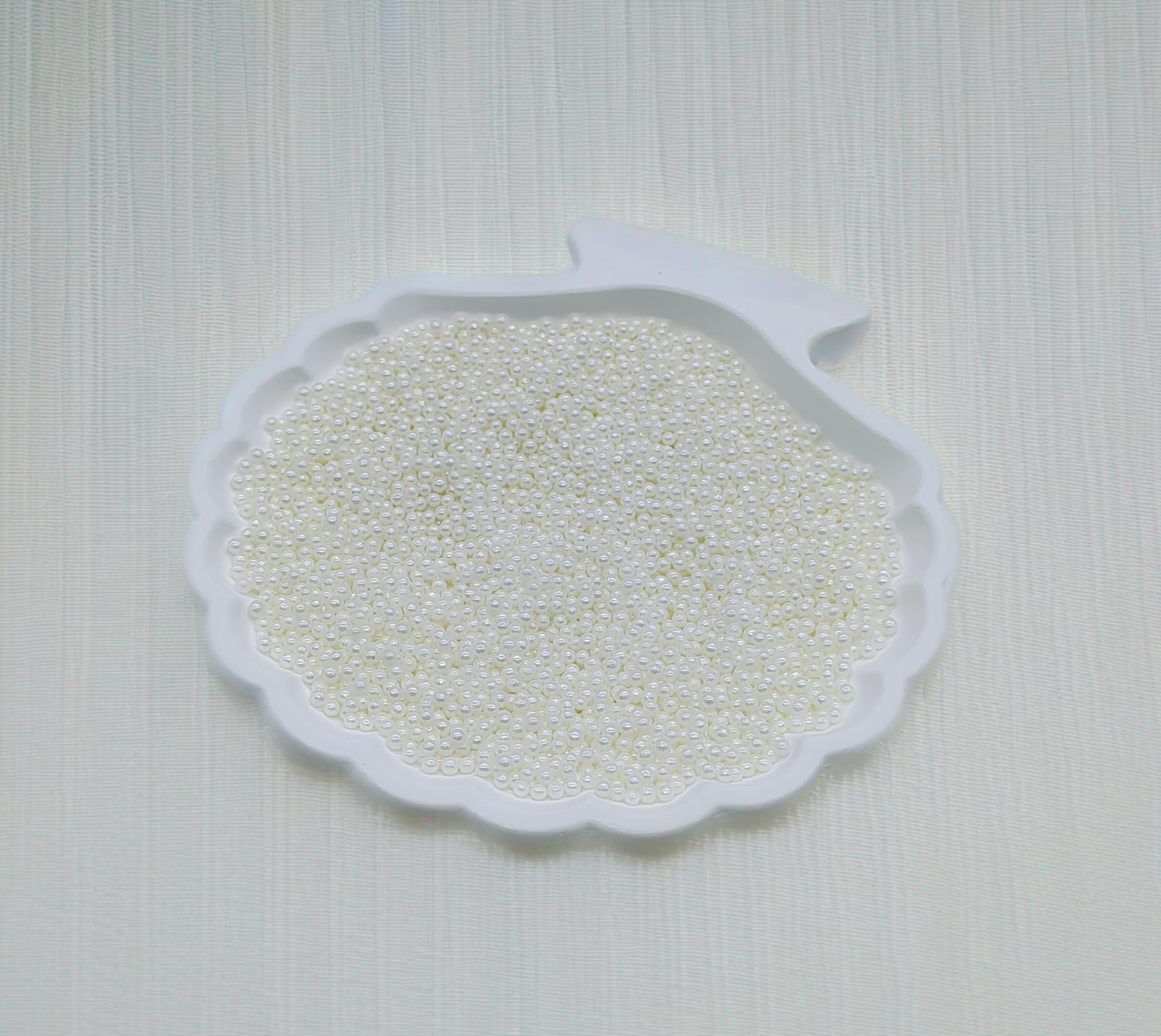 KANDLRIK wedding cake pearls in 2mm enhance elegance and detail.