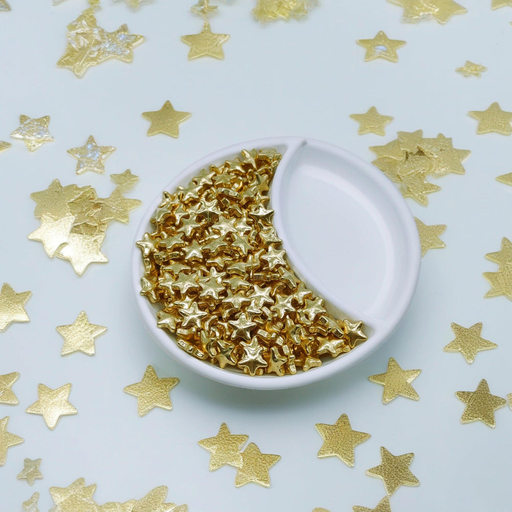 KANDLRIK gold stars cupcake toppers enhance desserts with refined sparkle.
