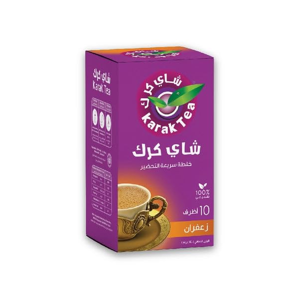Dissolving KARAK TEA premix sachet in hot water for creamy latte