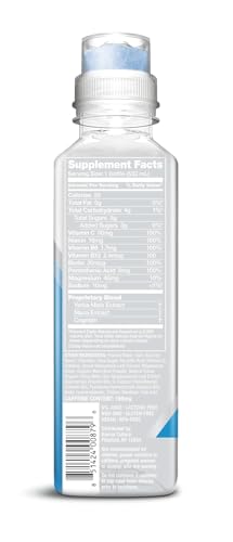 Karma Energy bottle being poured into a glass showing clarity