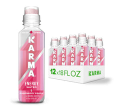 Karma Energy Drink Raspberry Peach bottle on desk for a refreshing pick-me-up