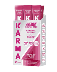 Karma Energy Packets Raspberry Peach dissolving in water for a refreshing lift