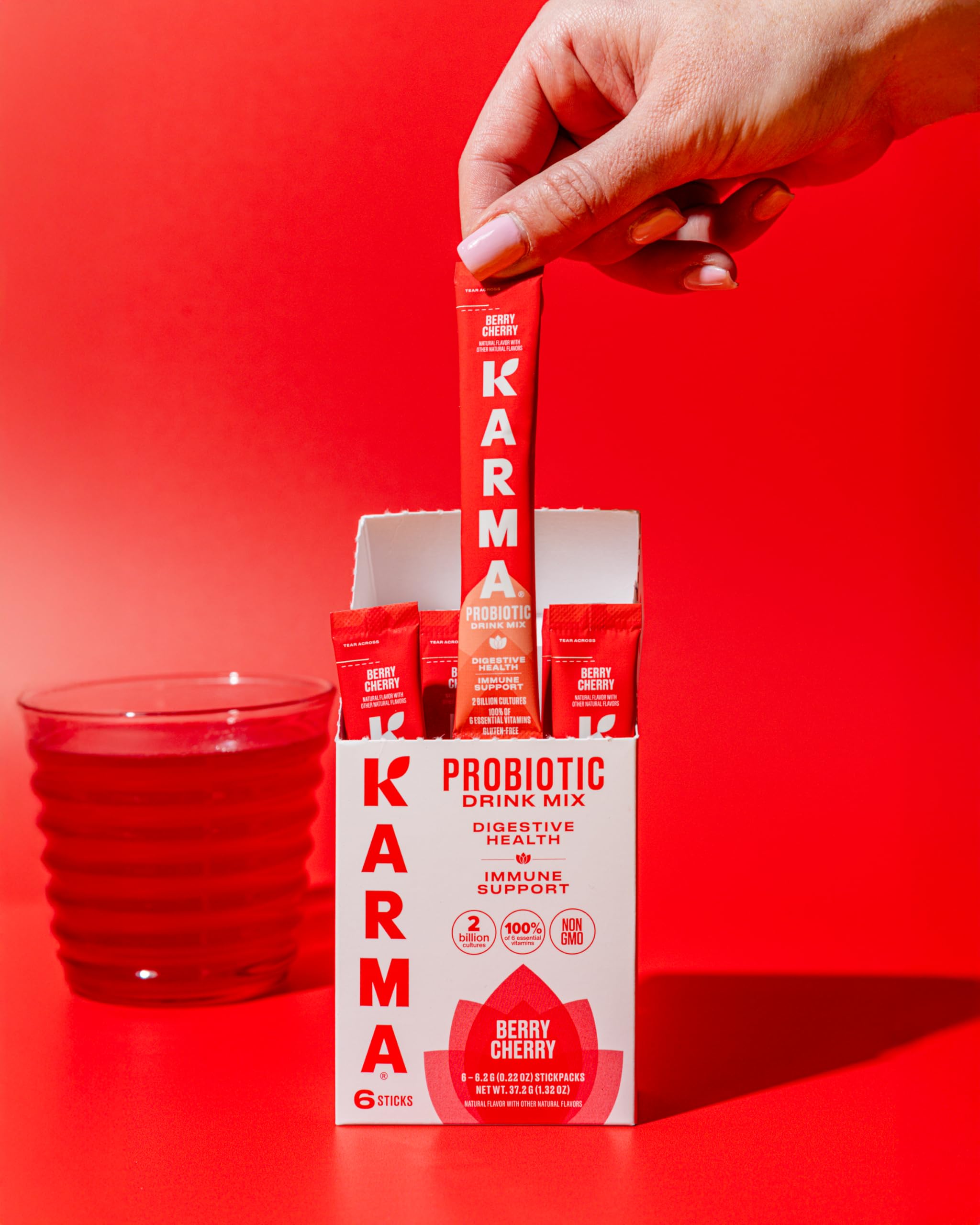Berry Cherry flavor sachet beside a glass of water