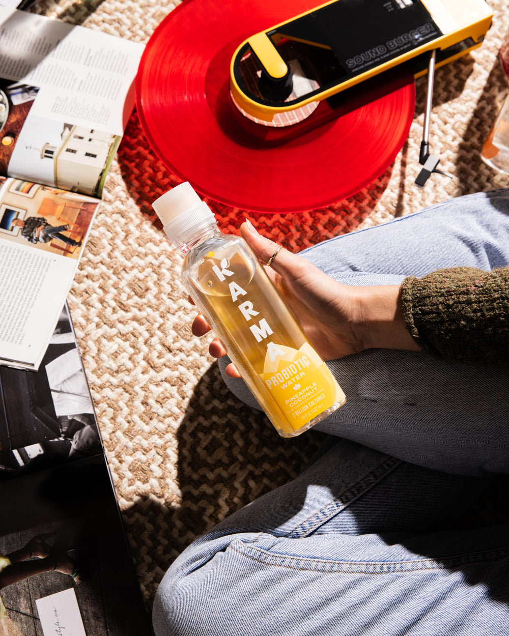 Karma brand logo on bottle representing trusted hydration.