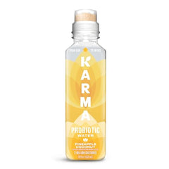Karma Probiotic Water pineapple coconut bottle label showing flavor and probiotics.