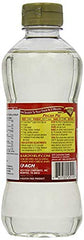 KARO Light Corn Syrup bottle being poured for glossy dessert glaze.
