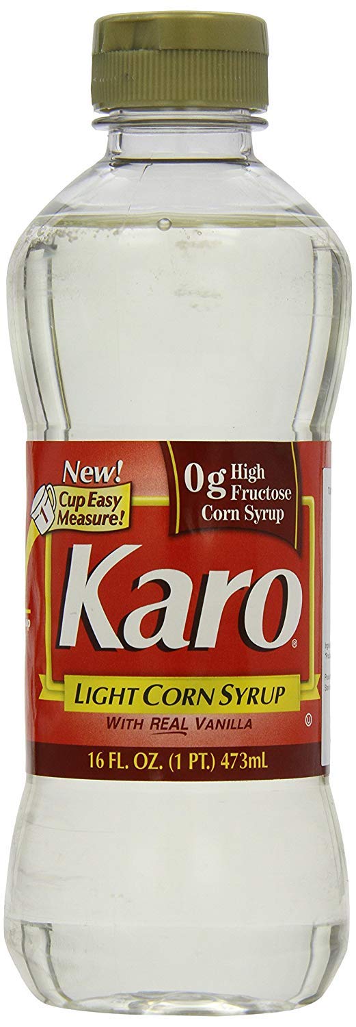 Pecan pie with KARO Light Corn Syrup glaze for classic dessert.