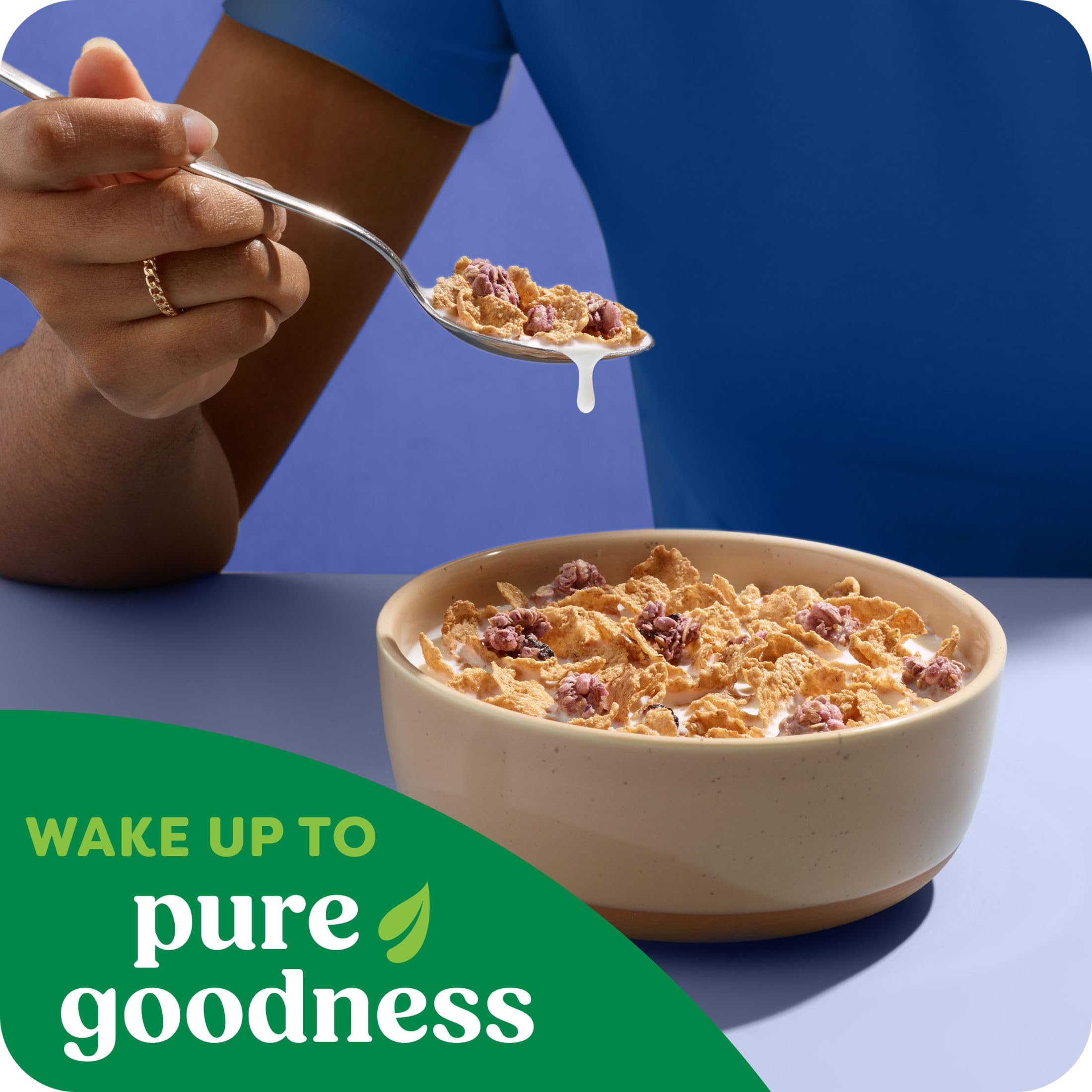 Family breakfast scene with Kashi Blueberry Clusters and milk