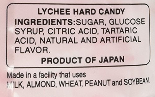 Kasugai Lychee Candy unwrapped pieces inviting fruity flavor.