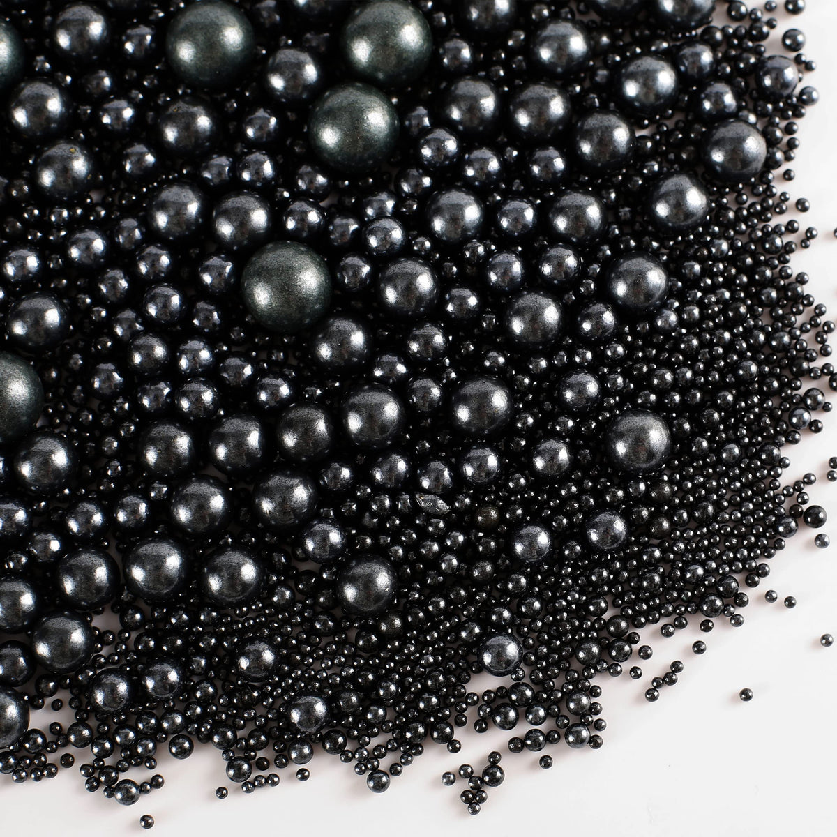 Kasvan Black Pearl Sugar bottle for cake decorating and gifting.