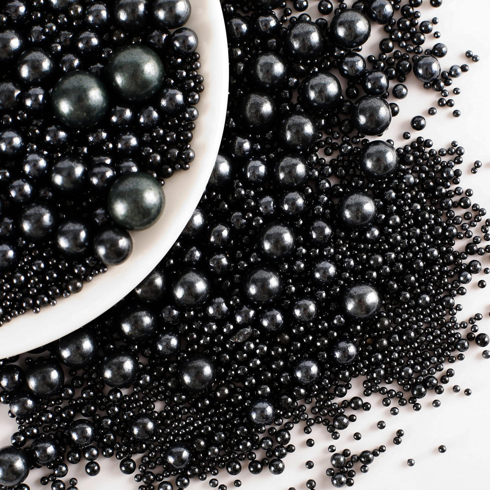 Kasvan Black Pearl Sugar cake decorations add glossy elegance to desserts.