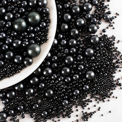 Kasvan Black Pearl Sugar cake decorations add glossy elegance to desserts.