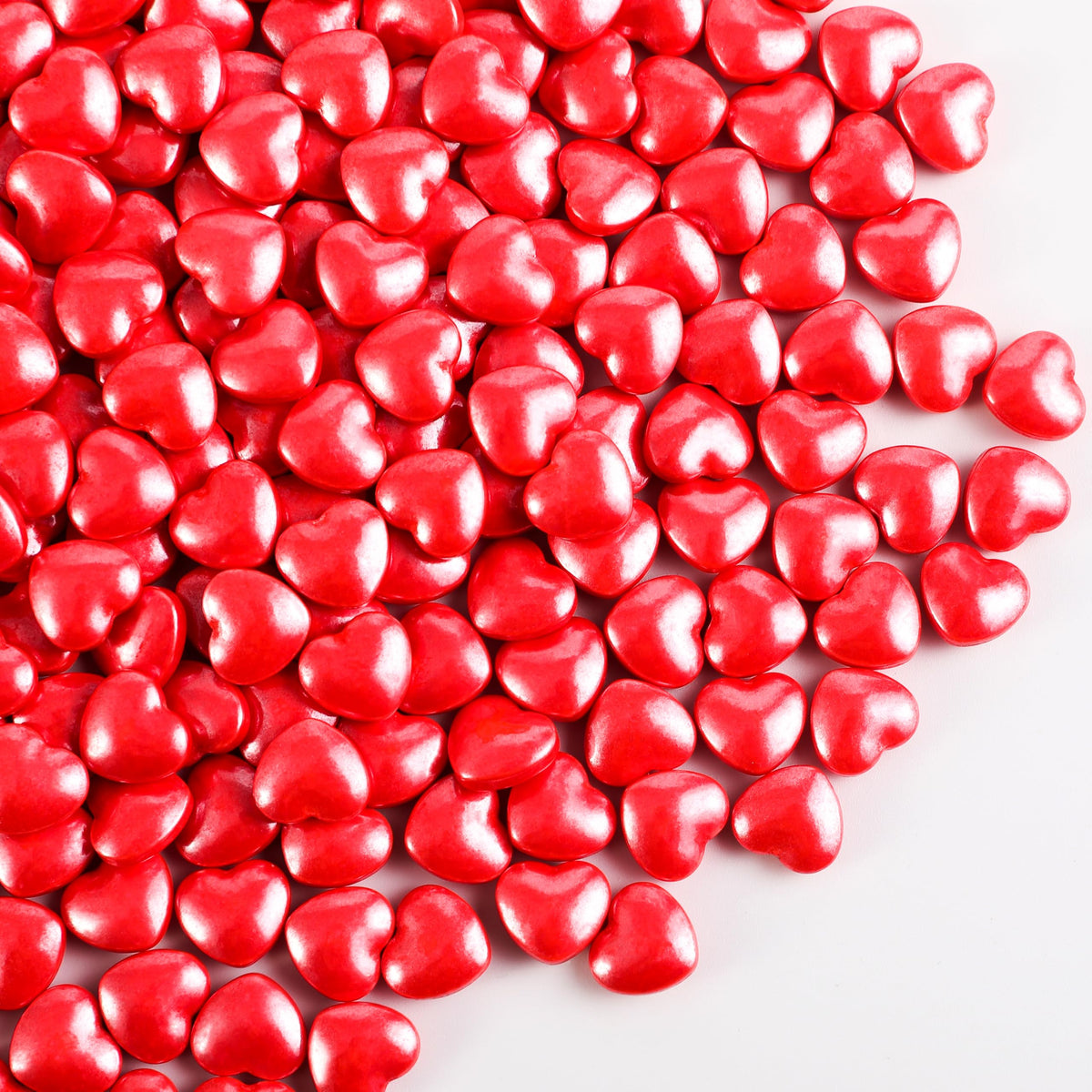 Kasvan Mixed Heart Sprinkles bottle close-up showing red pearl shapes for cake decoration