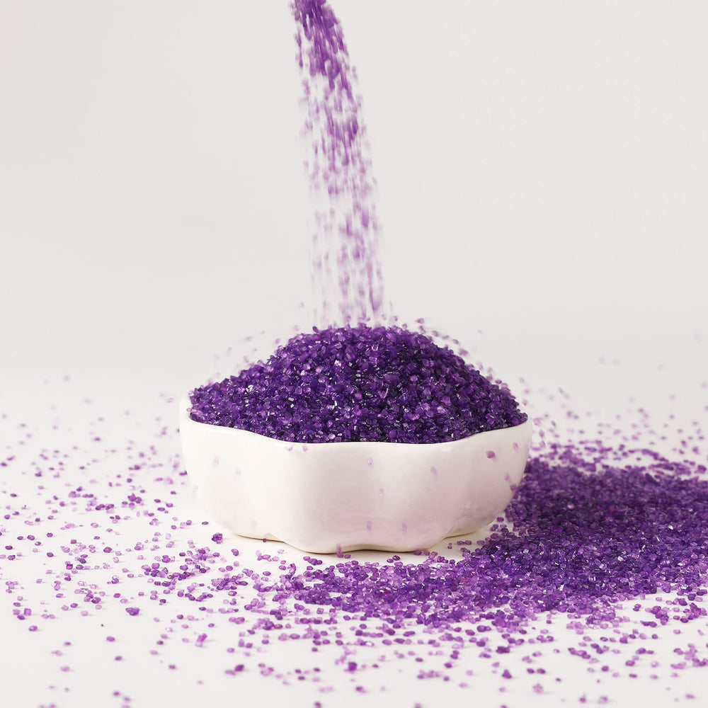Kasvan purple sanding sugar on cakes and fudge for decoration.