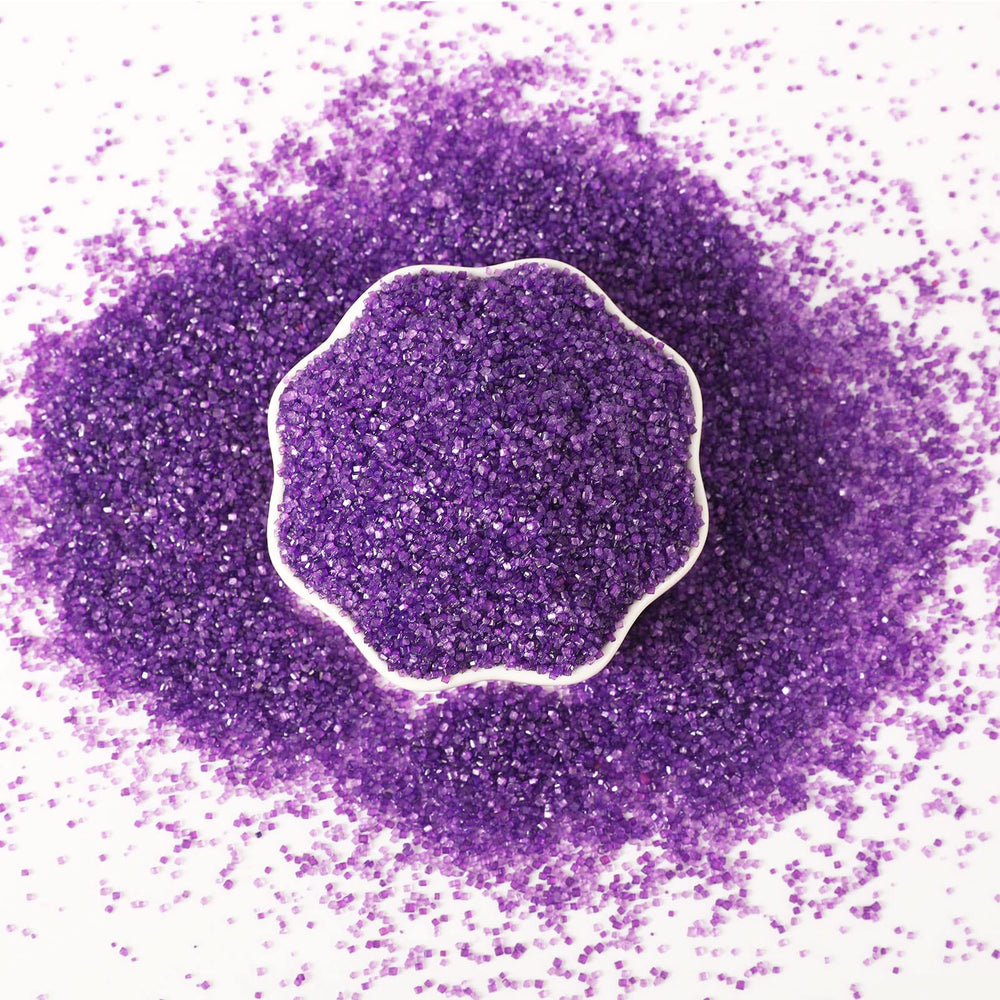 Kasvan purple sanding sugar sprinkled on cookies for elegant texture.