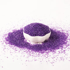 Kasvan purple sanding sugar topping ice cream with color pop.