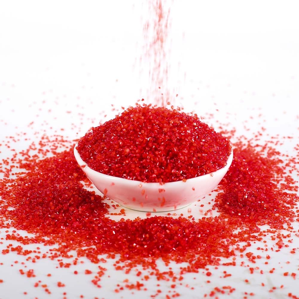 Ice cream topped with Kasvan Red Sanding Sugar crystals for color and crunch.