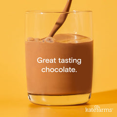 Kate Farms chocolate shake bottle side view shows nutrition facts for informed choices.