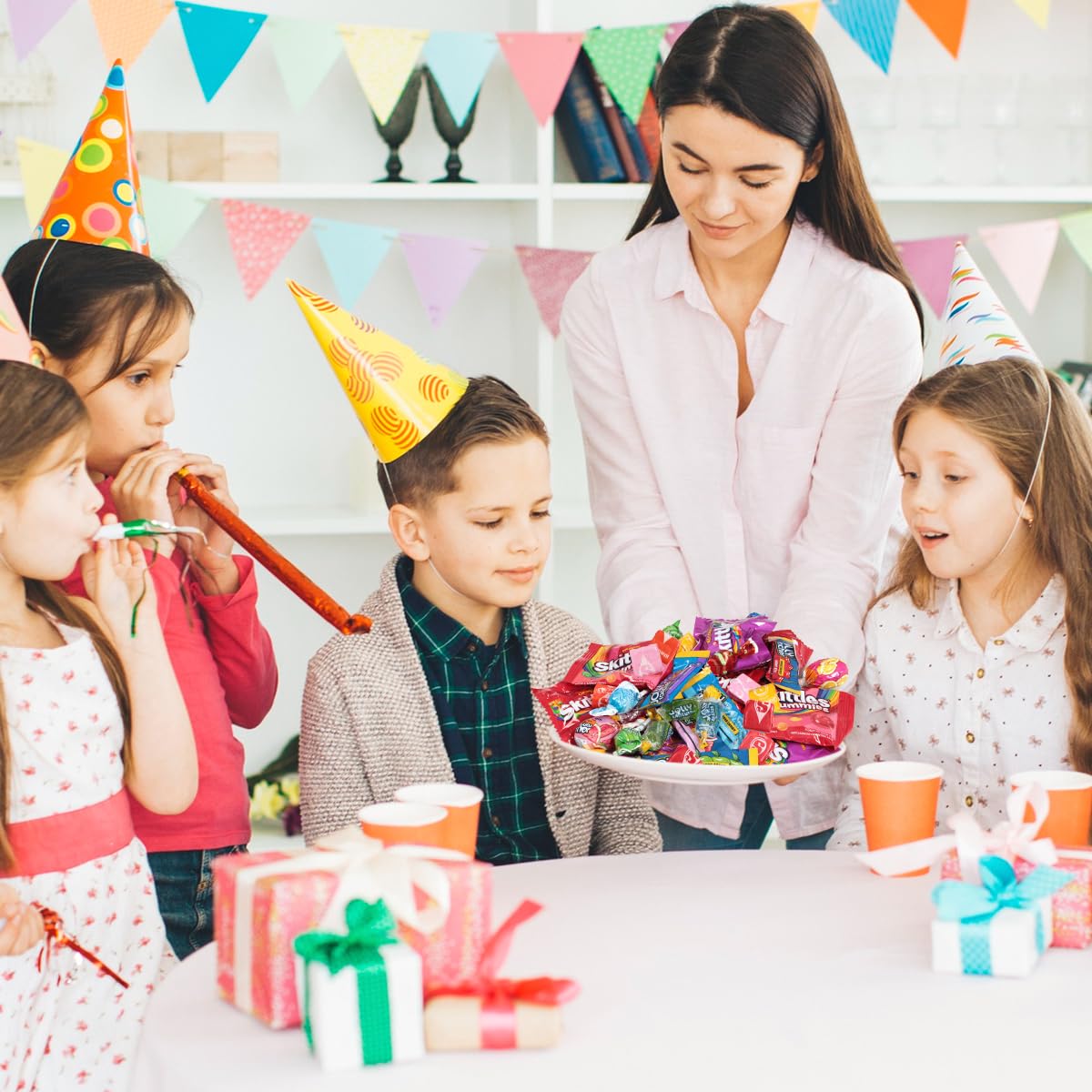 Party candy buffet setup by Katie’s Kandy Korner with colorful treats