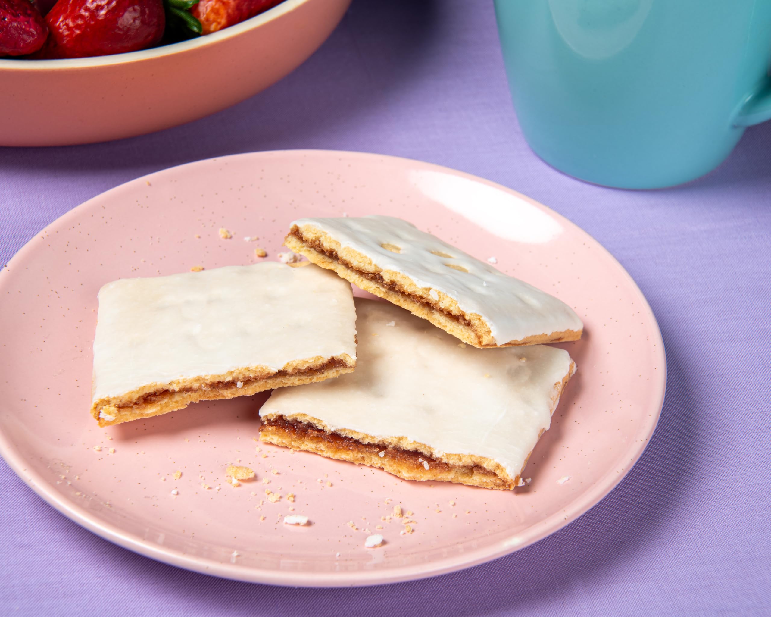 Katz gluten-free strawberry toaster pastries in toaster, ready in seconds.