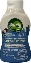 Nature's Charm condensed coconut milk being poured from the squeeze bottle.