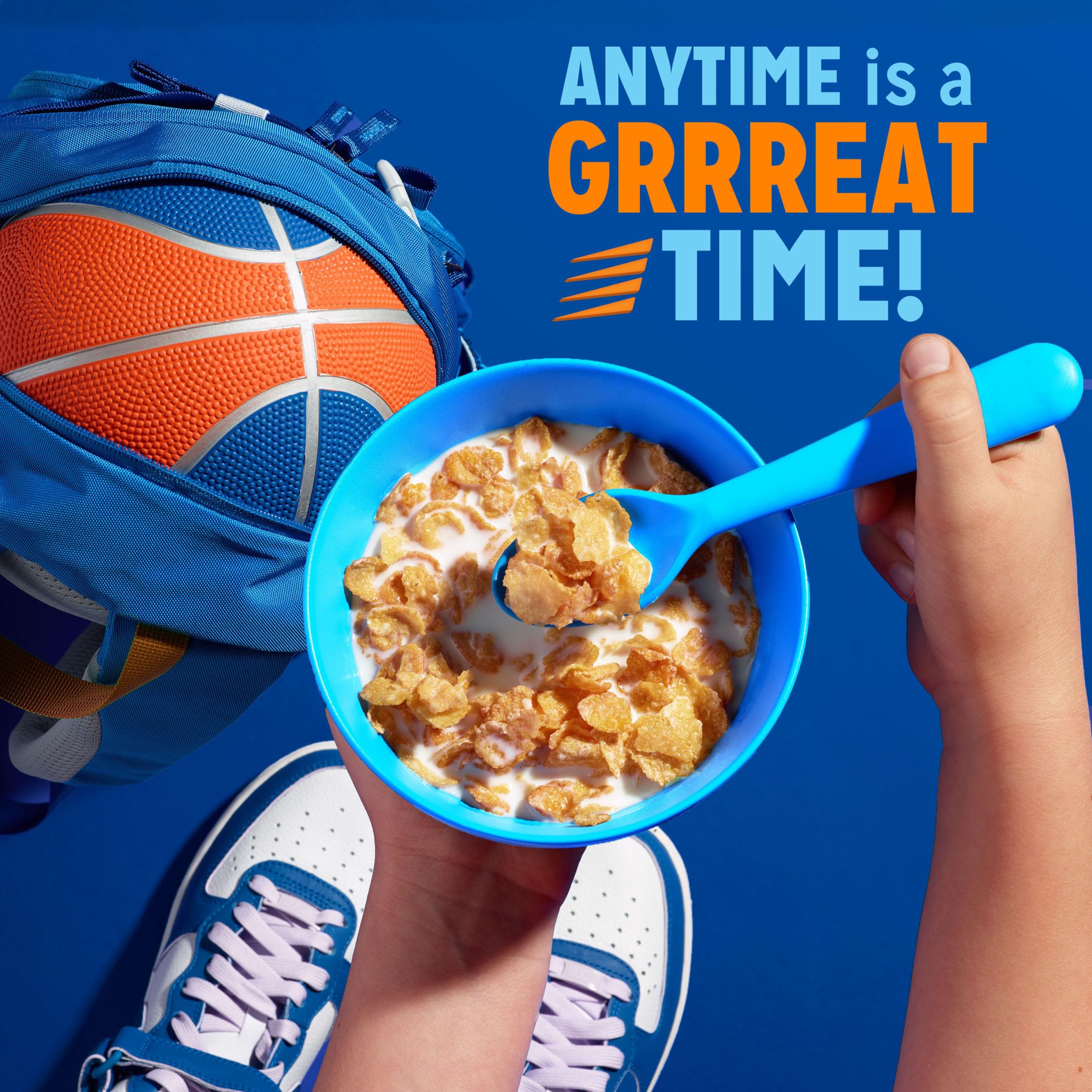 Kellogg's Frosted Flakes morning routine on a bright kitchen counter.