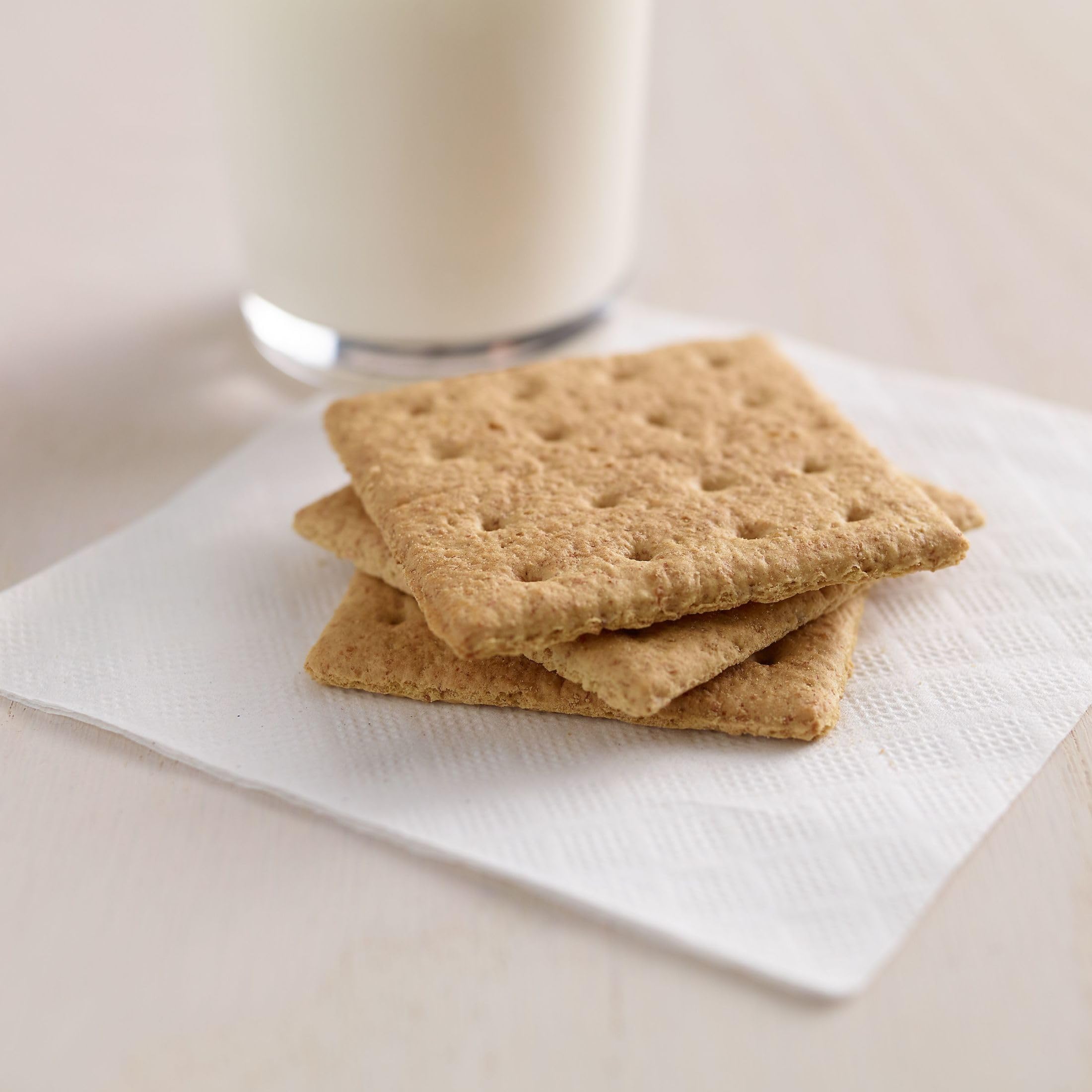 Individual sleeves of two crackers, Kellogg's Honey Grahams, convenient for lunches.